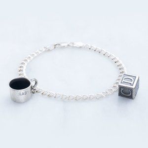 Silver charm bracelet with baby charms - Lot #010